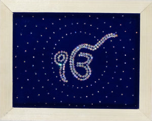 Ik Onkar " The Gurbani Icon of Oneness" is handmade by studding rhinestones on velvet with aureole around