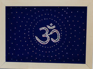 Om " The  Icon of Oneness" is handmade by studding rhinestones on velvet with aureole around